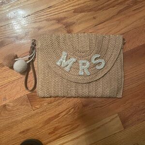 Tan Woven “Mrs.” Clutch with Pom- Pom Detail